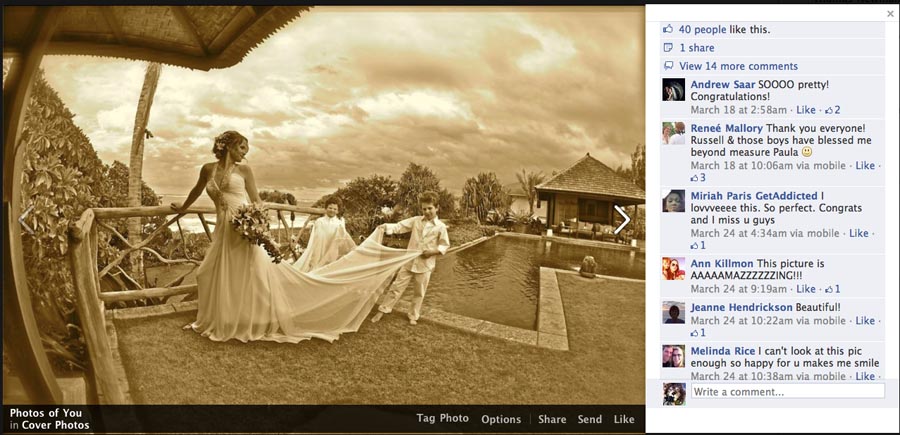 the children holding the brides dress for a picture on the grounds of the estate